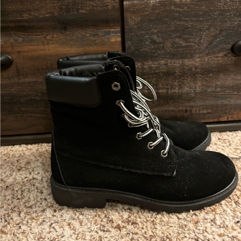black boots with white laces, size 8